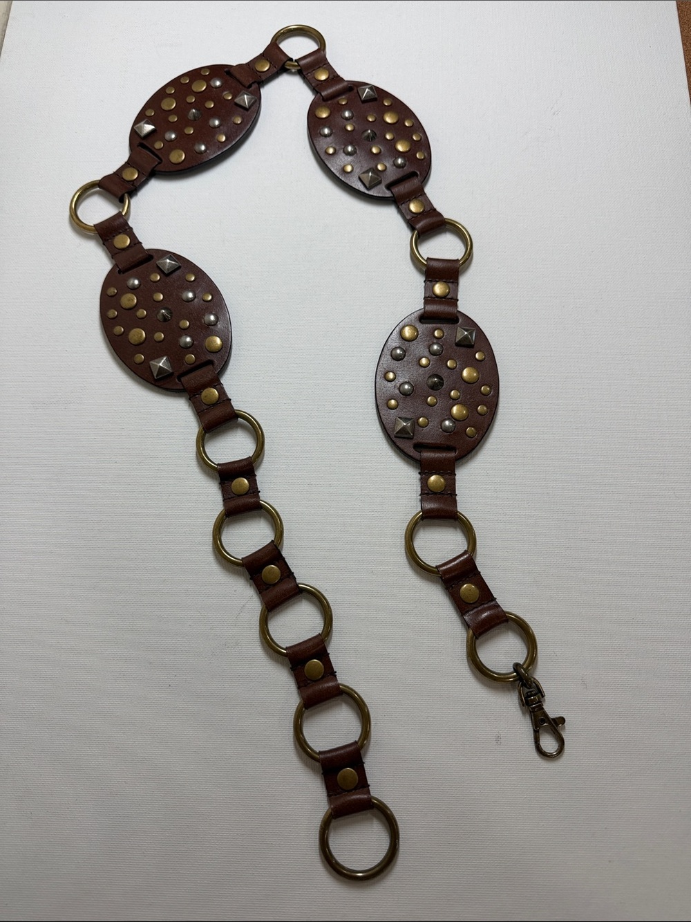 Brown Studded Leather Concho Belt with Brass Rings